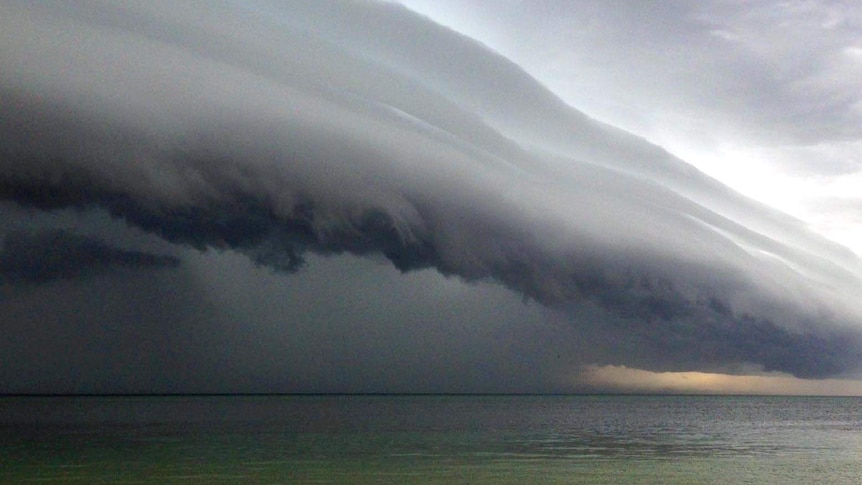 GENERIC storm front moving across an open body of water