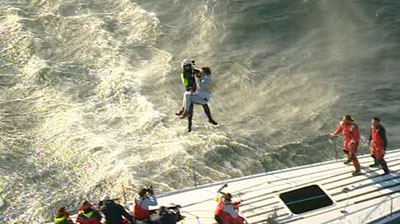 Injured yachtsmen being winched off Maximus during the Sydney to Hobart.