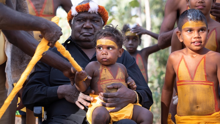 Yunupingu with Gumatj children at Garma in 2019.