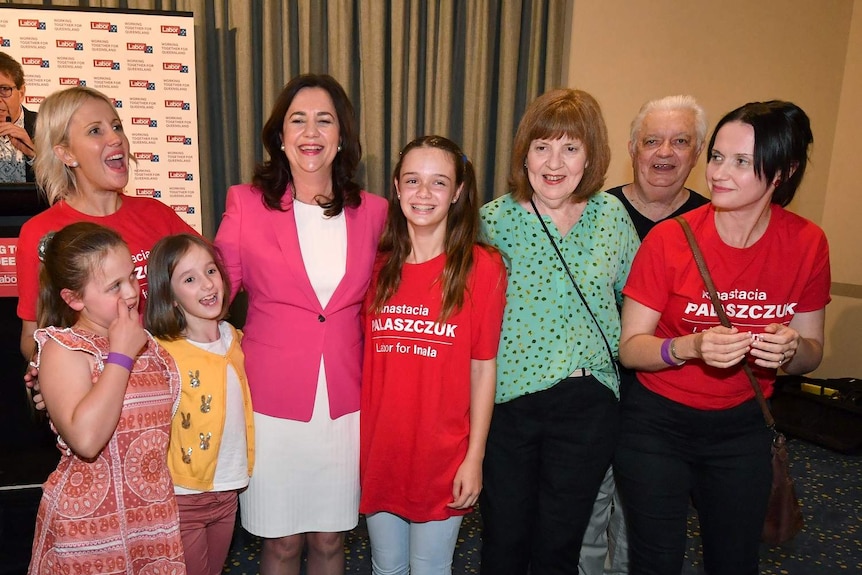 Queensland Premier Annastacia Palaszczuk is seen celebrating victory with her family at the Blue Fin Fishing Club in Brisbane.