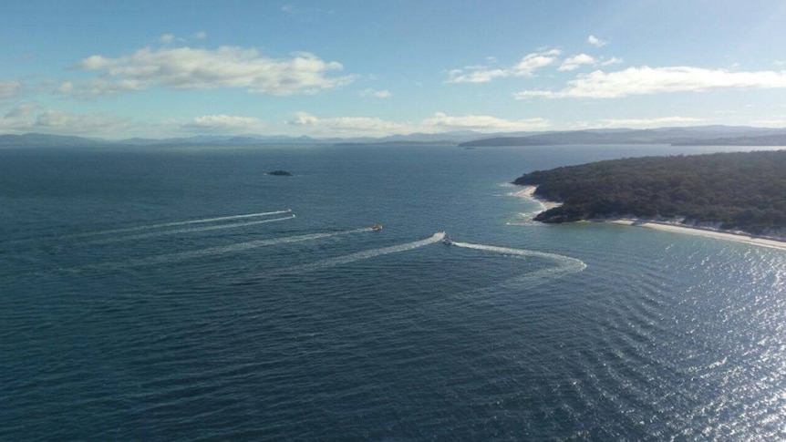 Police aerial shot of search boats.