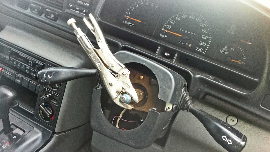 A pair of vice grips in place of a missing steering wheel