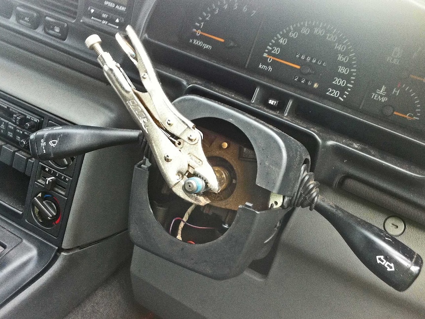 A pair of vice grips in place of a missing steering wheel