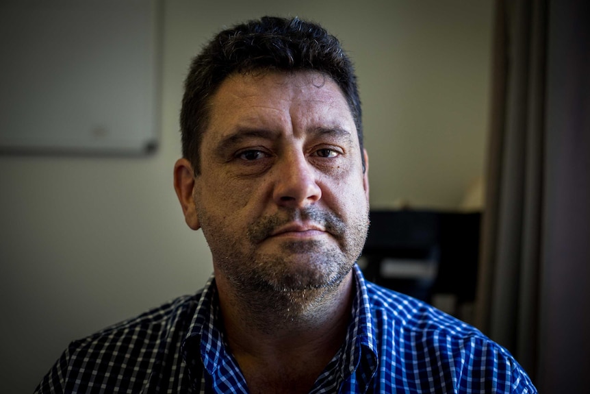 Gerhard Willemse from The Salvation Army in Tasmania looks directly at camera.