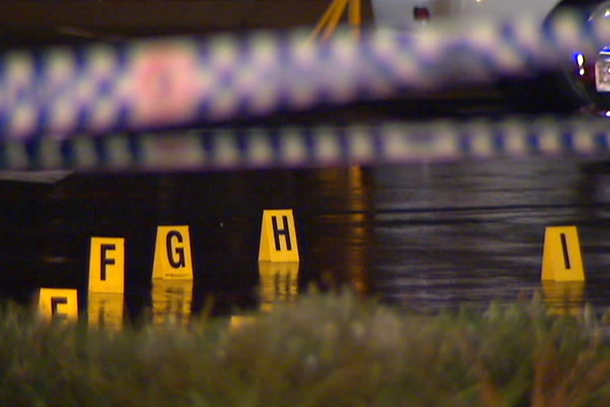 Crime scene markers in the carpark of Warrigal Square Shopping Centre at Eight Mile Plains.