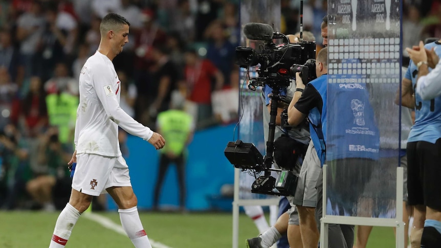 Cristiano Ronaldo trudges off after loss to Uruguay