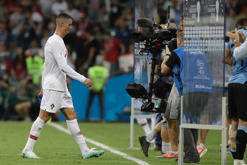 Cristiano Ronaldo trudges off after loss to Uruguay