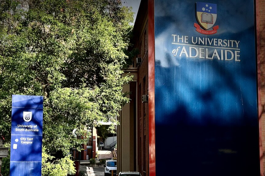 Signage for the universities of Adelaide and South Australia.