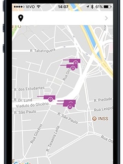 A smartphone with the Cataki app opened, displaying a map.