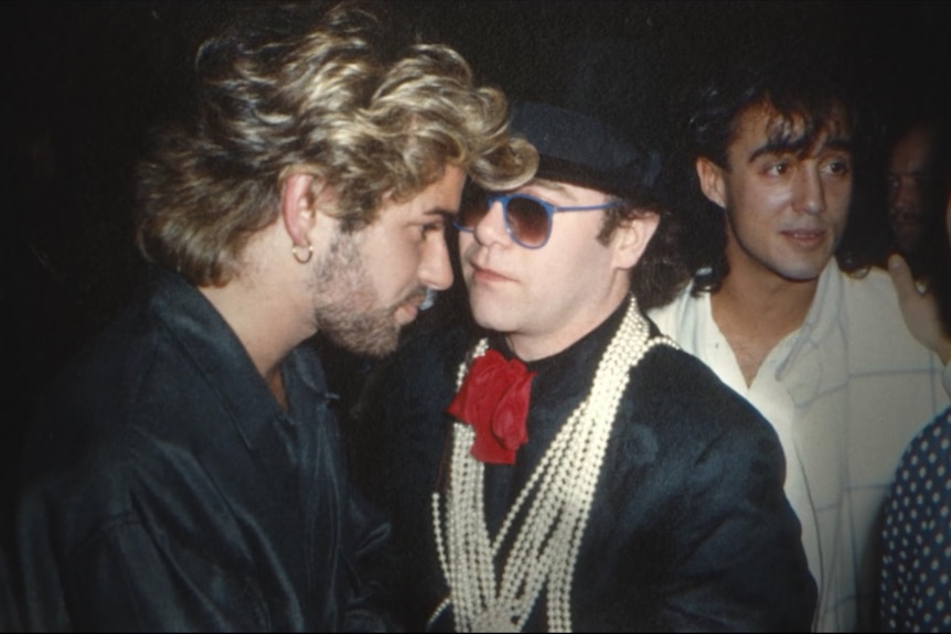 Elton John and George Michael talking