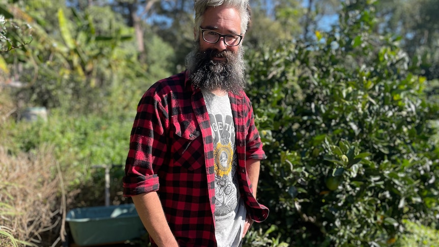 Photo of a man smiling.