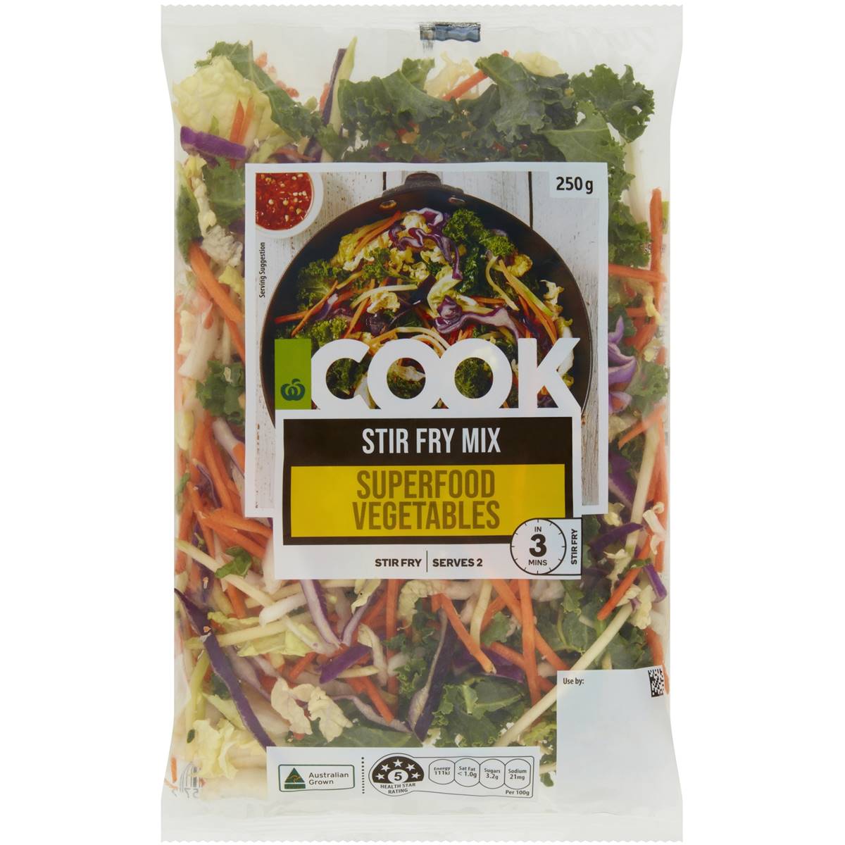 Chopped up vegetables and salad leaves in a pre-packaged plastic bag sold in a supermarket