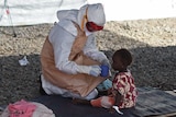 Nurse with Ebola toddler in Sierra Leone