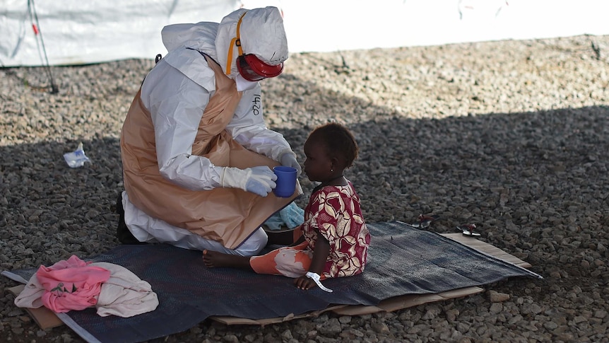 Nurse with Ebola toddler in Sierra Leone