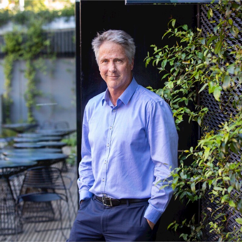 A man in a blue shirt