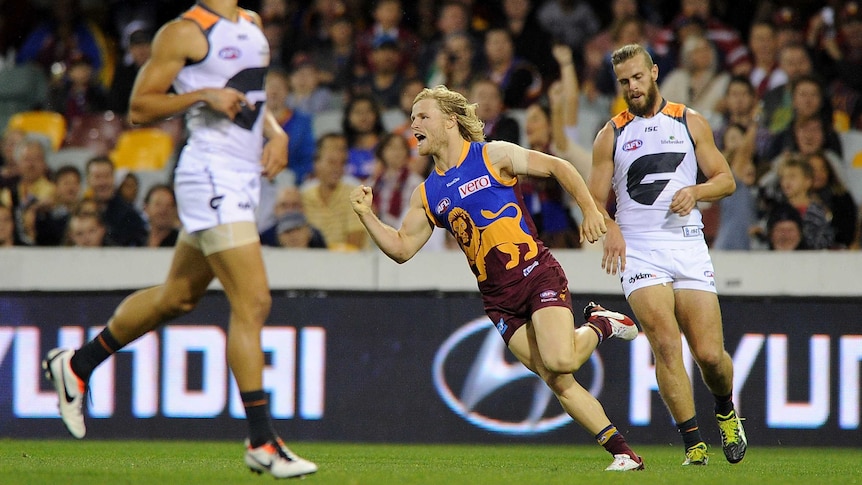 Brisbane's Daniel Rich celebrates a goal against GWS at the Gabba.