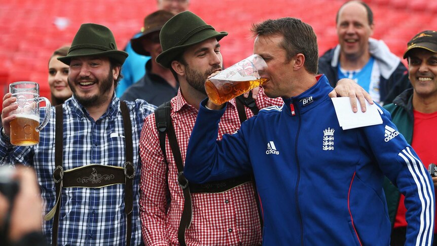 Graeme Swann celebrates England's Ashes win at Old Trafford