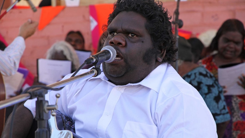 Jameson Casson leads the Gospel Choir from the AIM Church of Tennant Creek