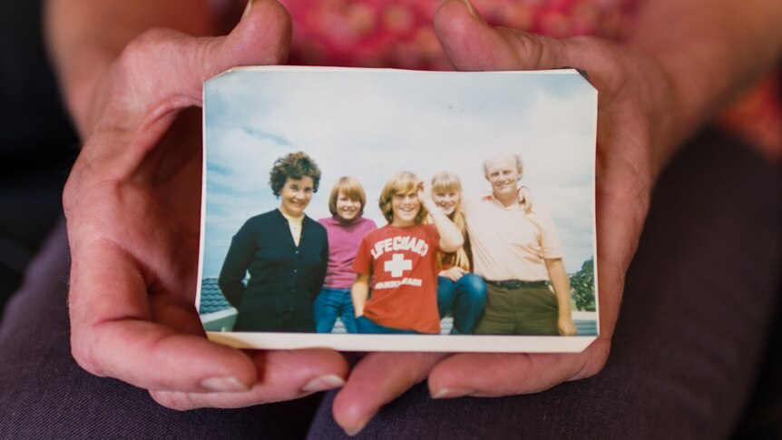 Rachel and her family with her brother Don front and centre in the photograph wearing a red t-sirt.