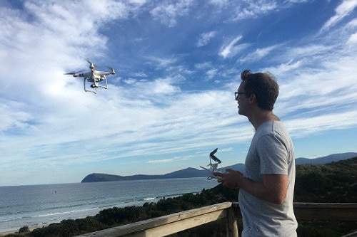 Jano Gibson learning to fly the drone in Tasmania before the cyclone.