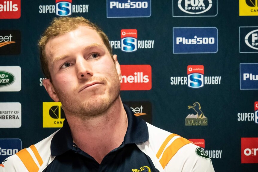 David Pocock looks to his left as he listens to questions at his Brumbies retirement media conference.