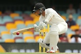 Kane Williamson negotiates a delivery on day four at the Gabba