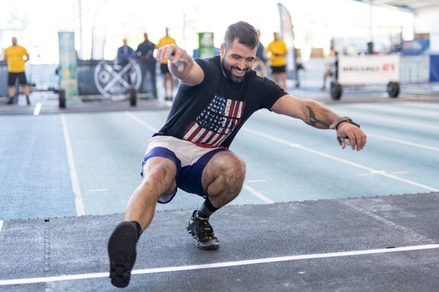 A US contestant at the 2018 Functional Fitness world championships conducts a one-legged pistol squat.