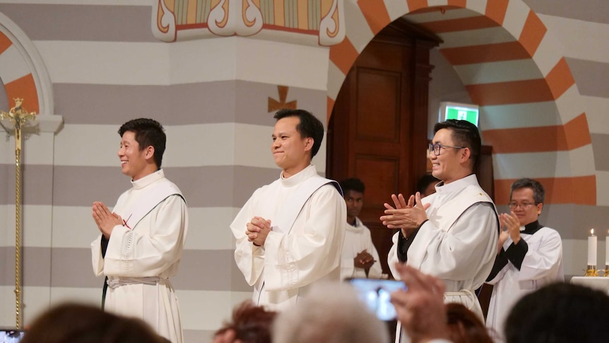 The three priests at their ordination.