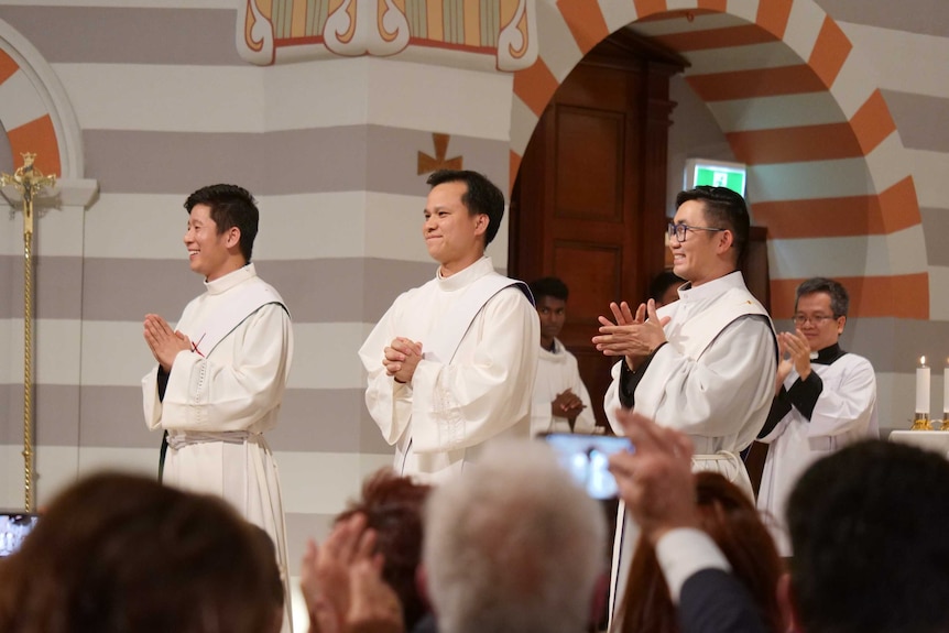 The three priests at their ordination.