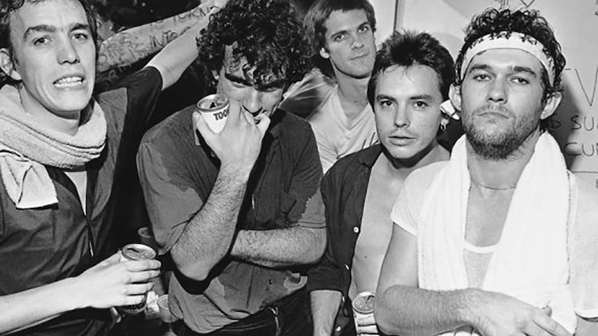 The members of Australian rock band Cold Chisel in a dressing room in the early days of their career.