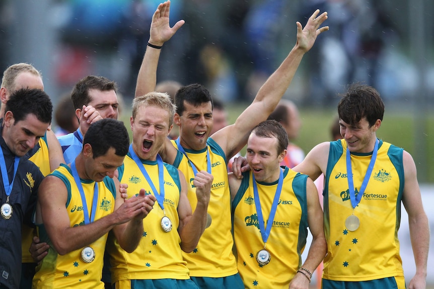 Not in it for riches ... the Kookaburras left for London on Wednesday.