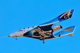 a white and blue spaceship flies above the earth