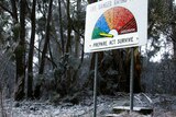 A fire danger rating sign covered in snow at Mount Victoria, in the Blue Mountains.