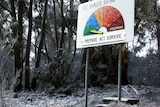 A fire danger rating sign covered in snow at Mount Victoria, in the Blue Mountains.