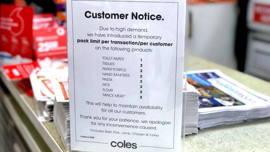 A message to customers at a Coles supermarket limiting purchases of some products.