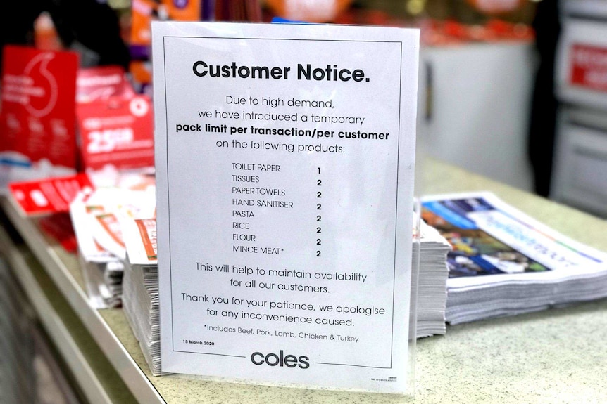 A message to customers at a Coles supermarket limiting purchases of some products.