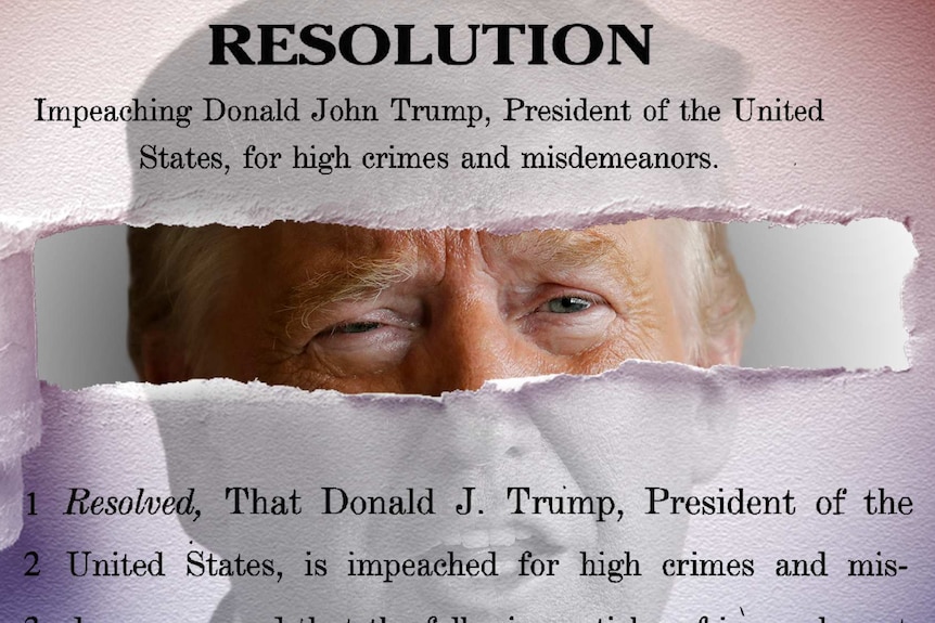 US President Donald Trump behind the text of his Articles of Impeachment