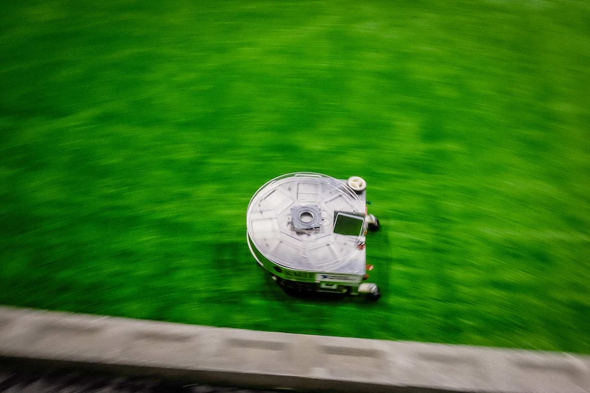 The RMIT robot speeds across the mod grass