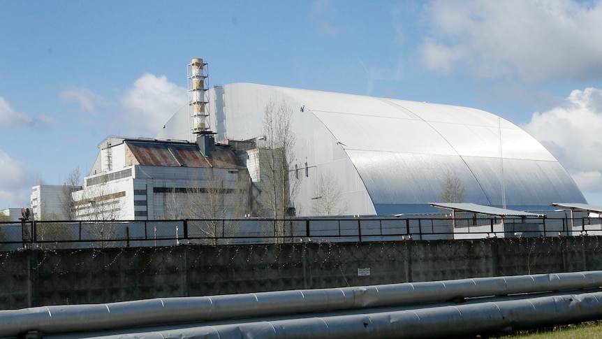 A shelter construction covers the exploded reactor at the Chernobyl nuclear plant