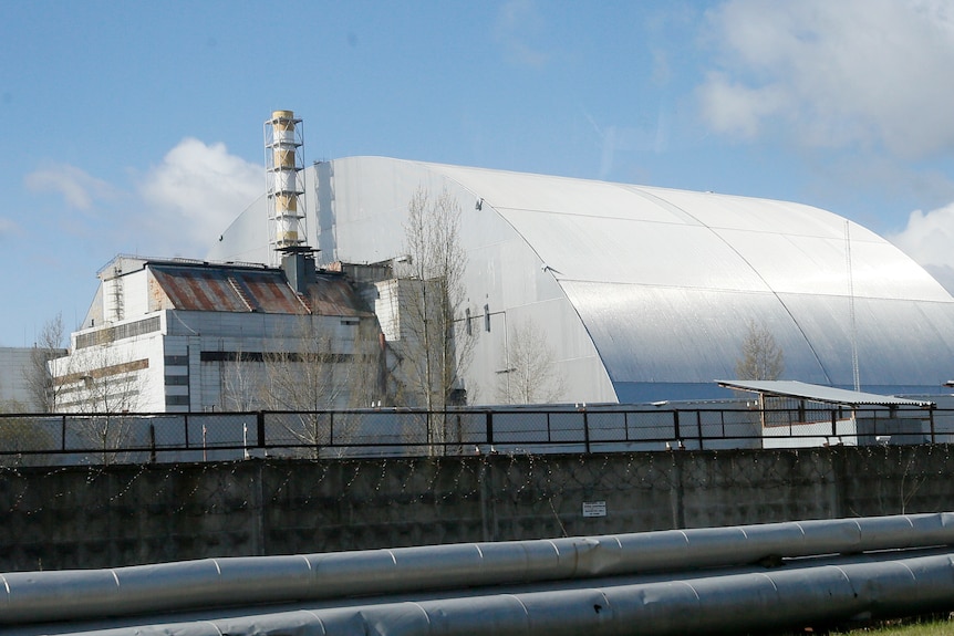 A shelter construction covers the exploded reactor at the Chernobyl nuclear plant