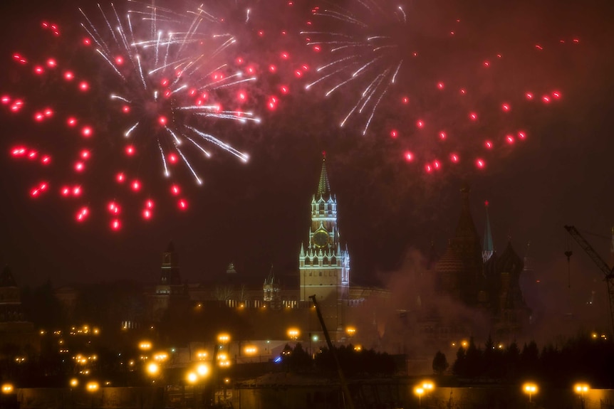 Fireworks explode over the Kremlin, during the New Year celebration in Moscow, Russia.