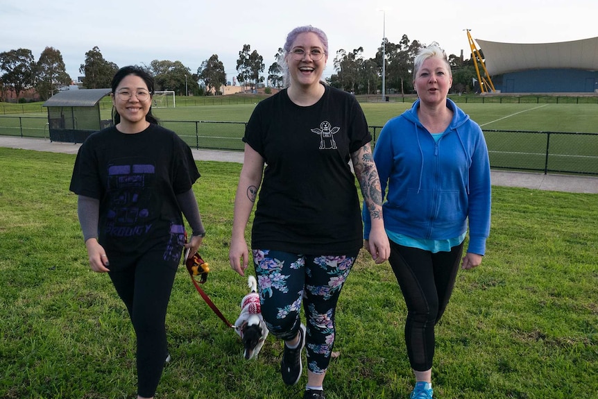 Brunswick residents Andrea Tsujii, Alixandra Sampson and Anita van Rooyen walk towards to camera.