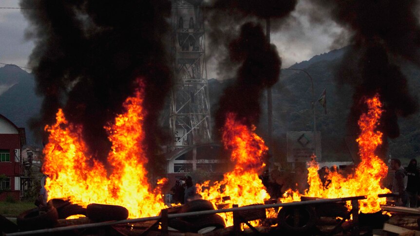 A barricade built by coal miners burns during clashes with the Spanish riot civil guard.