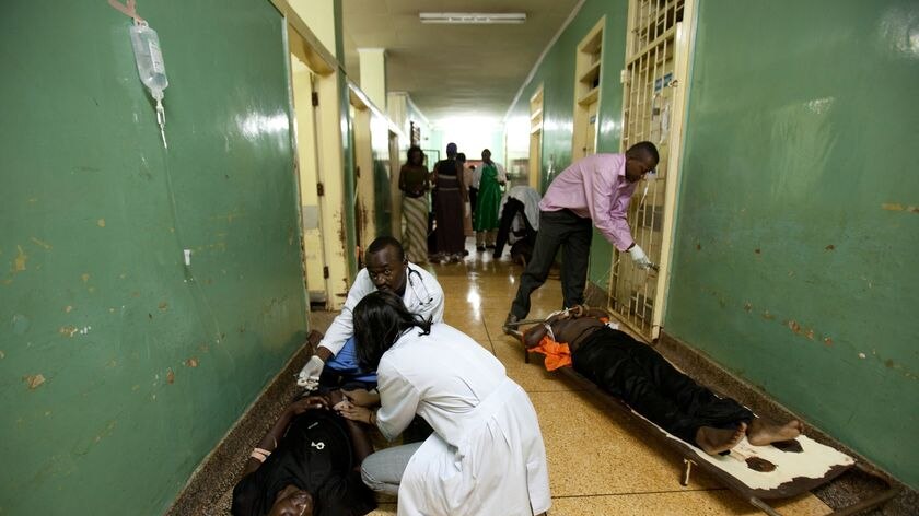 Paramedics attend to injured Ugandans