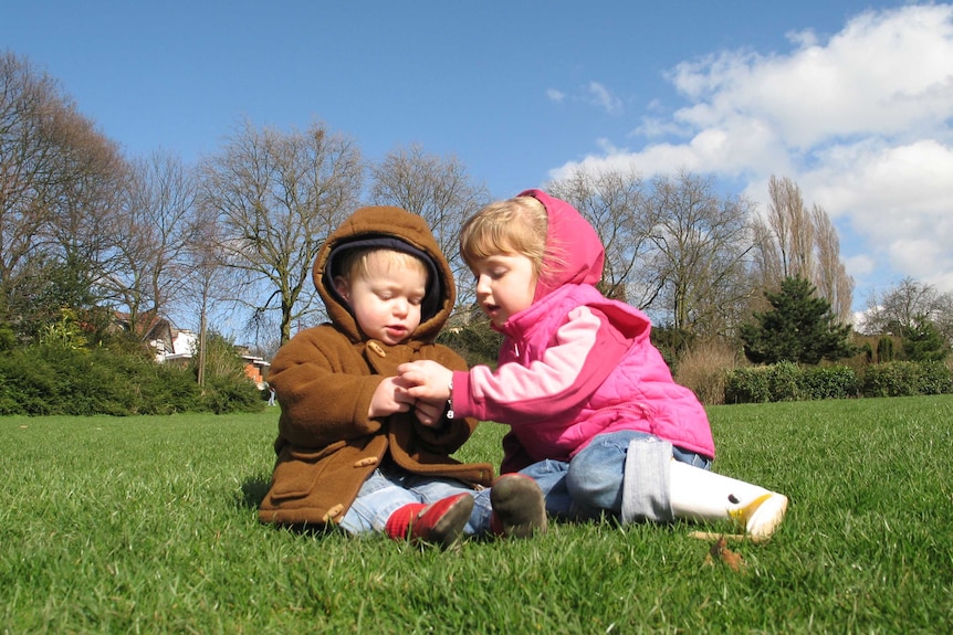 Brother and sister playing