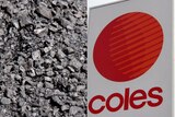 A pile of coal is pictured next to a Coles sign.