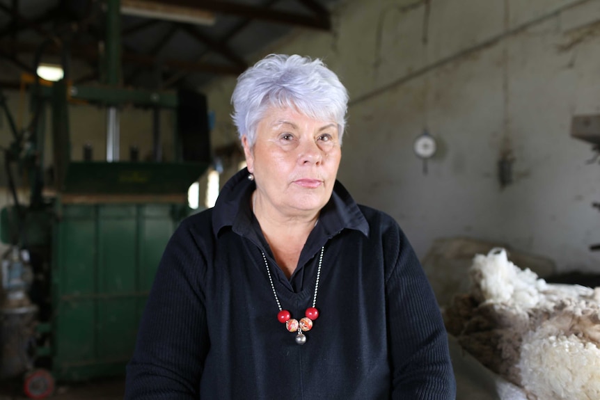 Farmer Pam Mitchell in a shed.