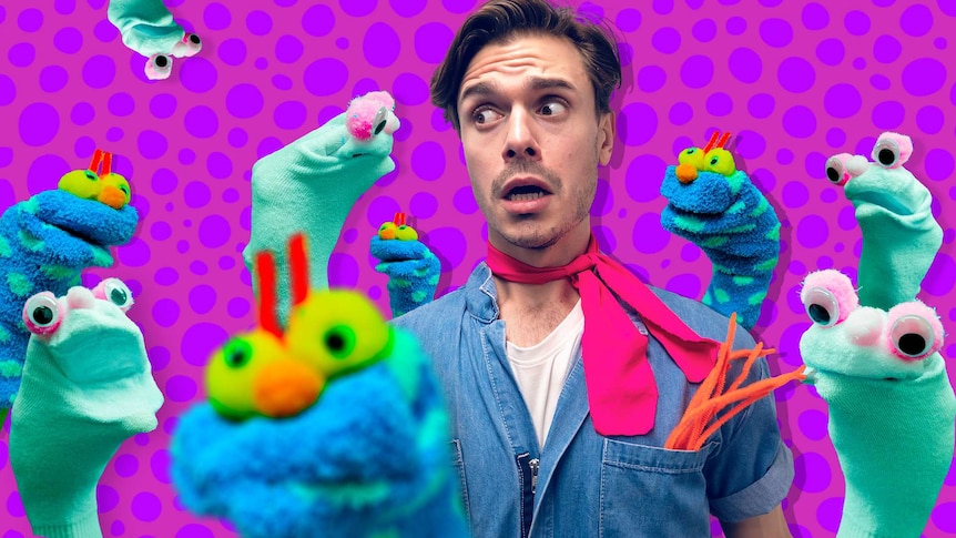 Jack looks scared as a bunch of sock puppets (some white, some purple with dots) seem to be taking over.