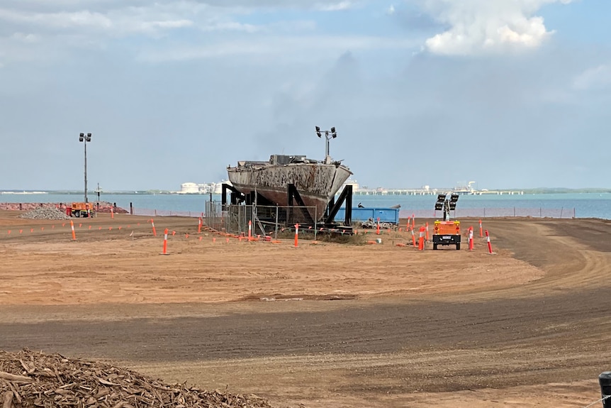 The vessel Rushcutter on a specially made cradle in the middle of a construction site