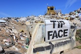 A bulldozer works at the current Esperance rubbish tip site.